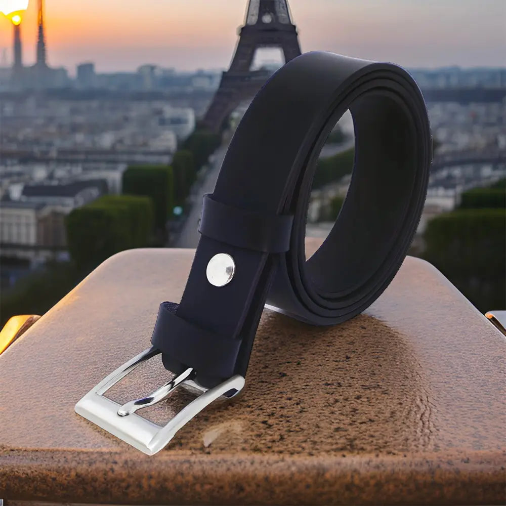 Black leather belt with silver buckle showing vegetable tanning offers exceptional style