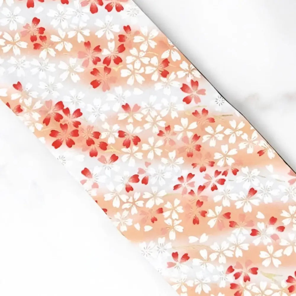 Floral patterned fabric showcasing an elegant obi belt and wallet accessories design