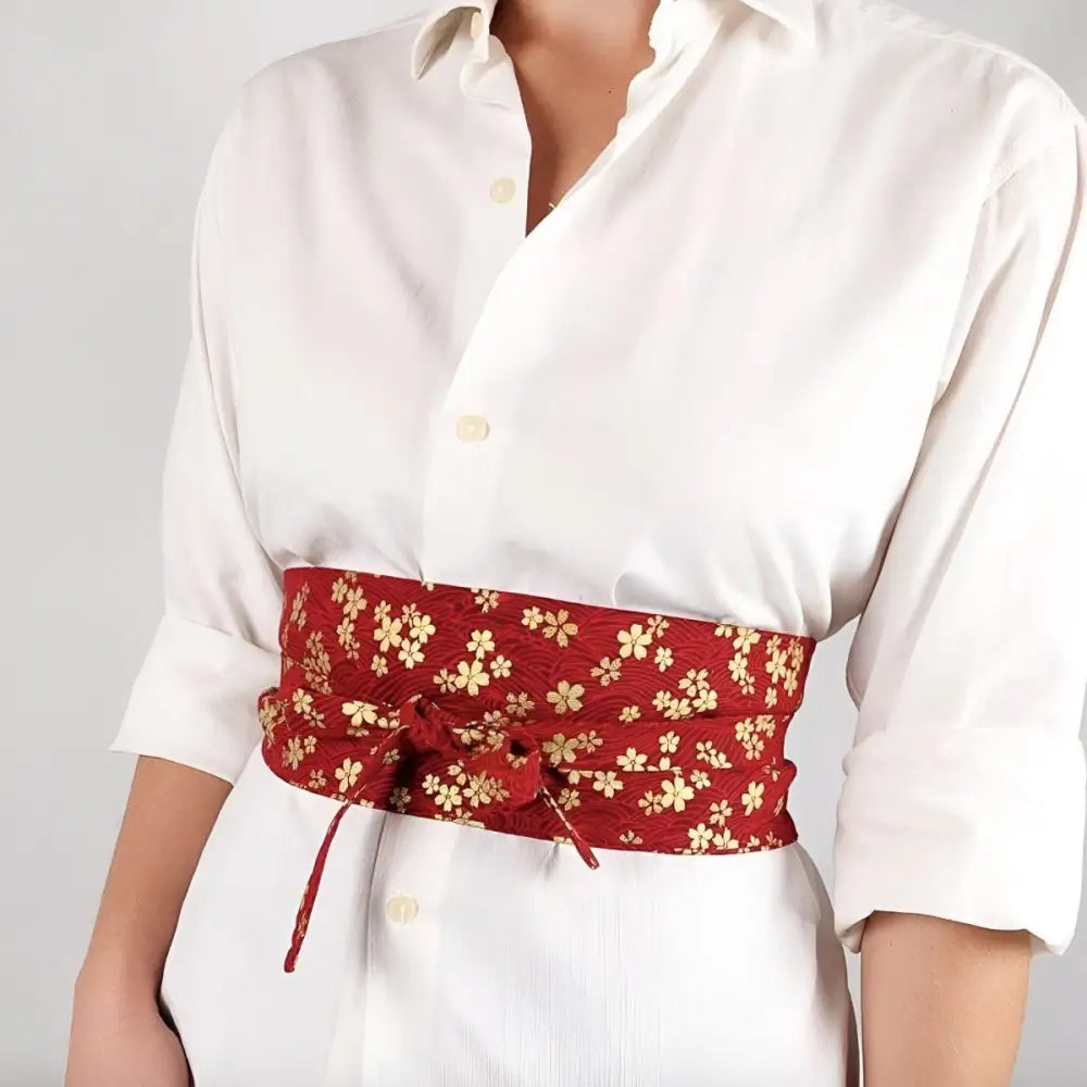 Red and gold floral obi belt with sakura flower-patterned design for elegant accessory