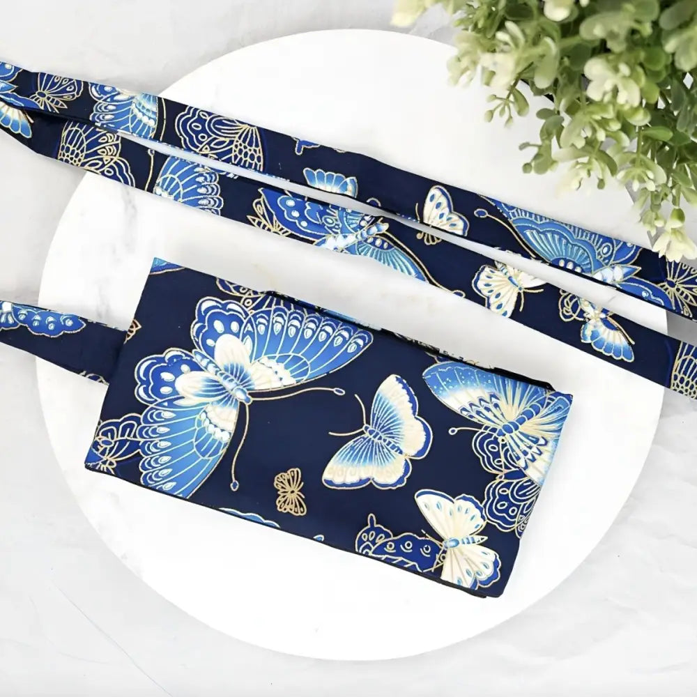 Blue butterfly patterned fabric wallet and strap from the Blue Butterfly Patterned Fabric Accessories Collection
