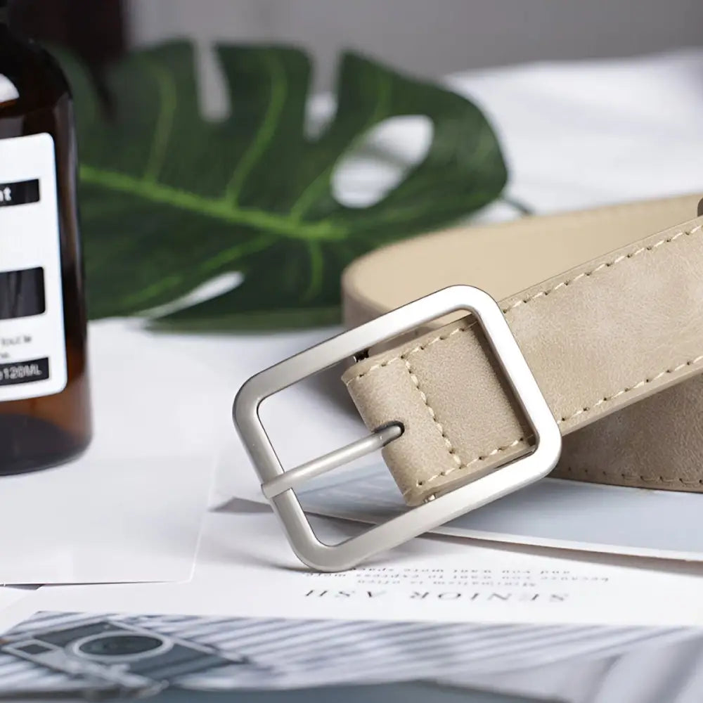 Beige leather belt with a silver buckle from Assorted Leather Belts collection