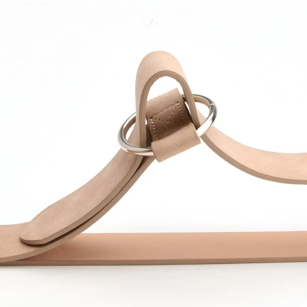Beige leather hanger with metal ring displayed on Taupe and Brown Belts with Silver Circular Buckles