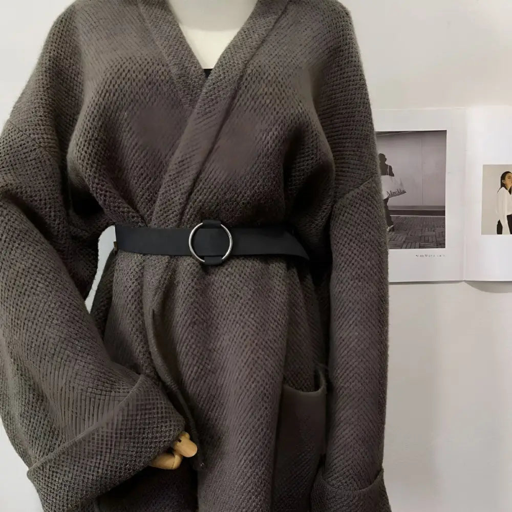 Gray knit cardigan with black belt from Taupe and Brown Belts featuring silver or circular buckles