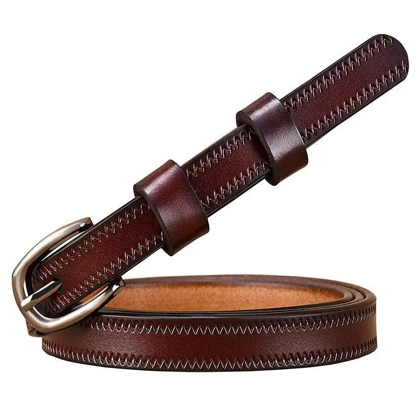 Seianthi belt featuring a brown leather strap with silver buckle and zigzag stitching