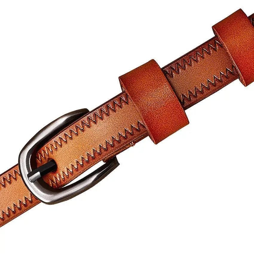 Seianthi belt showcasing brown leather with silver buckle and zigzag stitching
