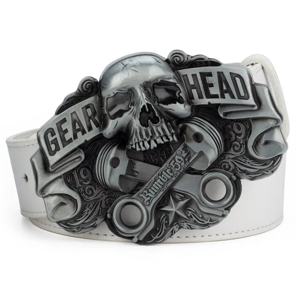 White leather belt featuring a skull and pistons buckle for a bold fashion statement