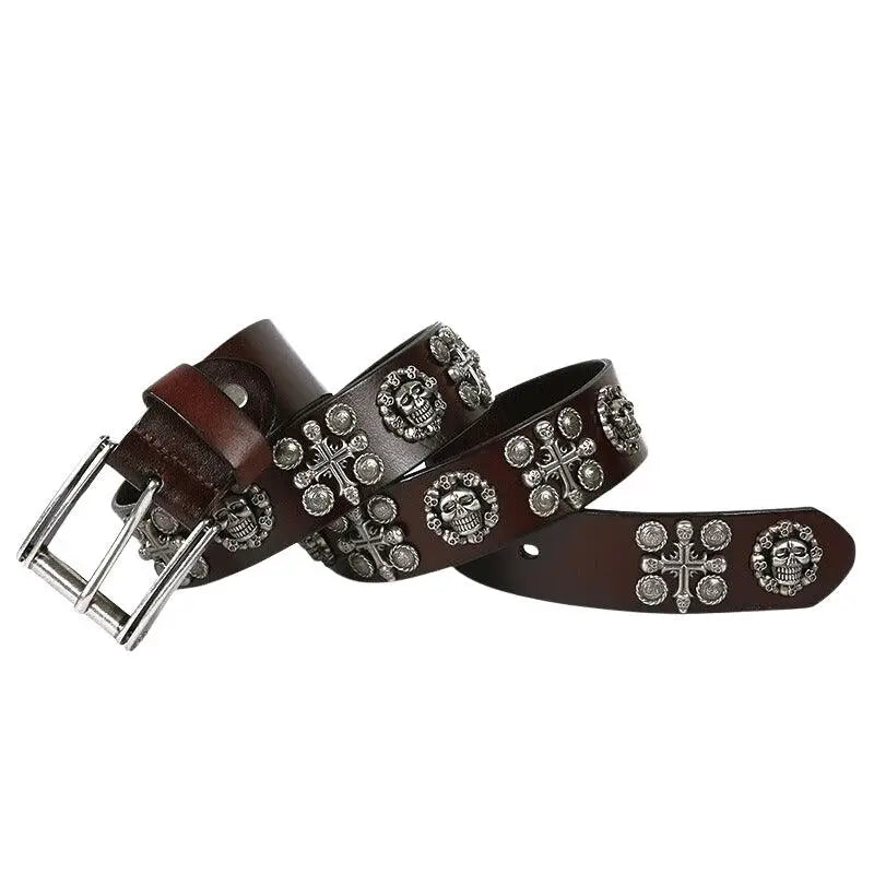 Kimo belt featuring brown leather and skull cross embellishments for a bold look