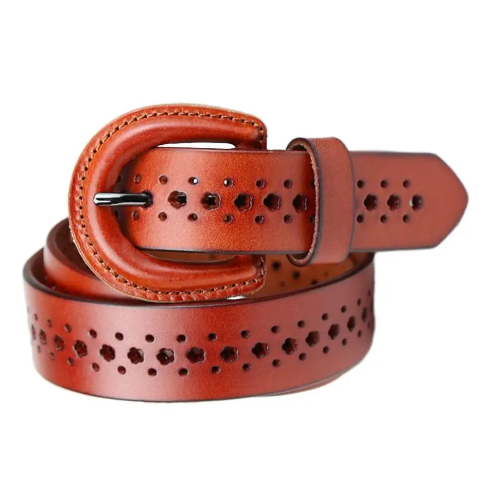 Mia Belt featuring brown leather with decorative circular cutouts and perforations