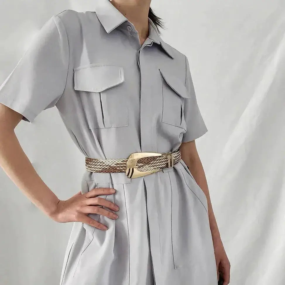 Gray jumpsuit with a woven belt from the Hezo Belt Collection in neutral tones