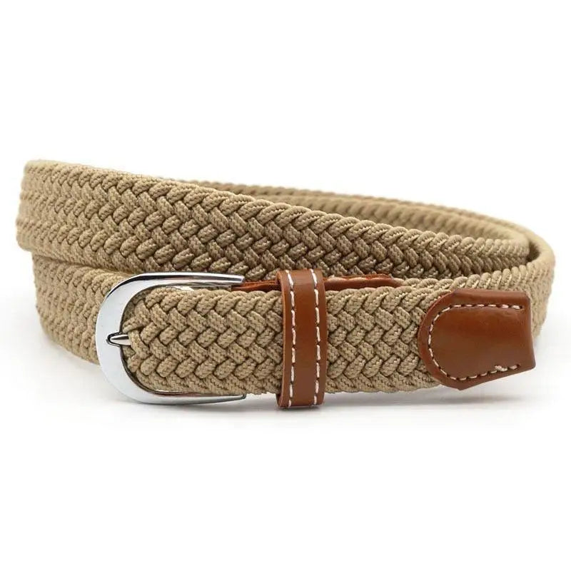 Braided beige elastic belt with brown leather accents and a silver buckle on display