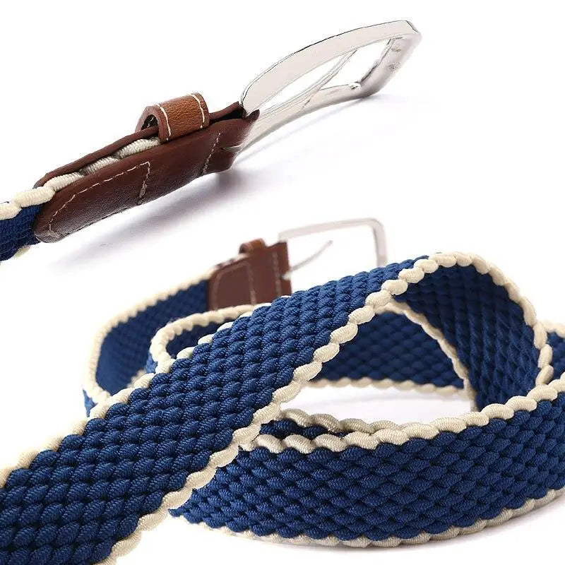 Blue braided elastic belt with brown leather accents and a silver buckle