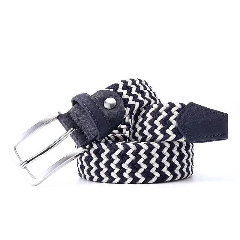 Black and white braided elastic belt with leather accents and silver buckle for versatile fashion