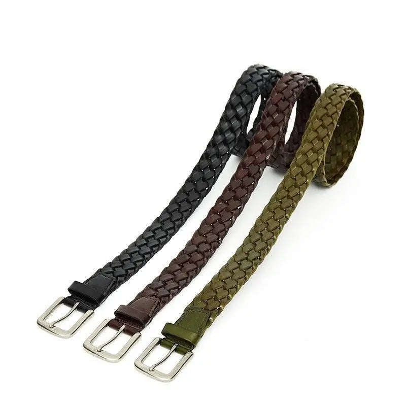 Three braided leather belts with metal buckles in brown and green colors