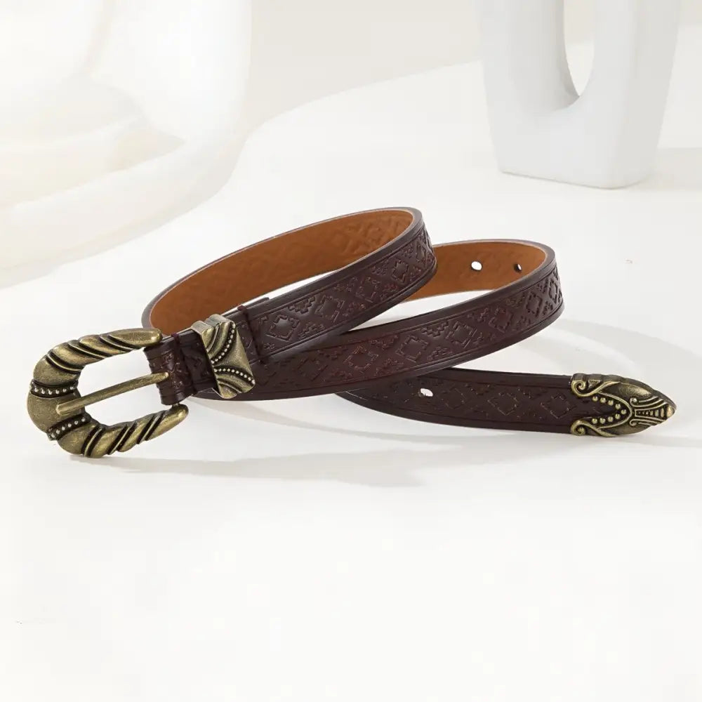 Brown leather Imada Western Belt with ornate metal buckle and tip for authentic western style