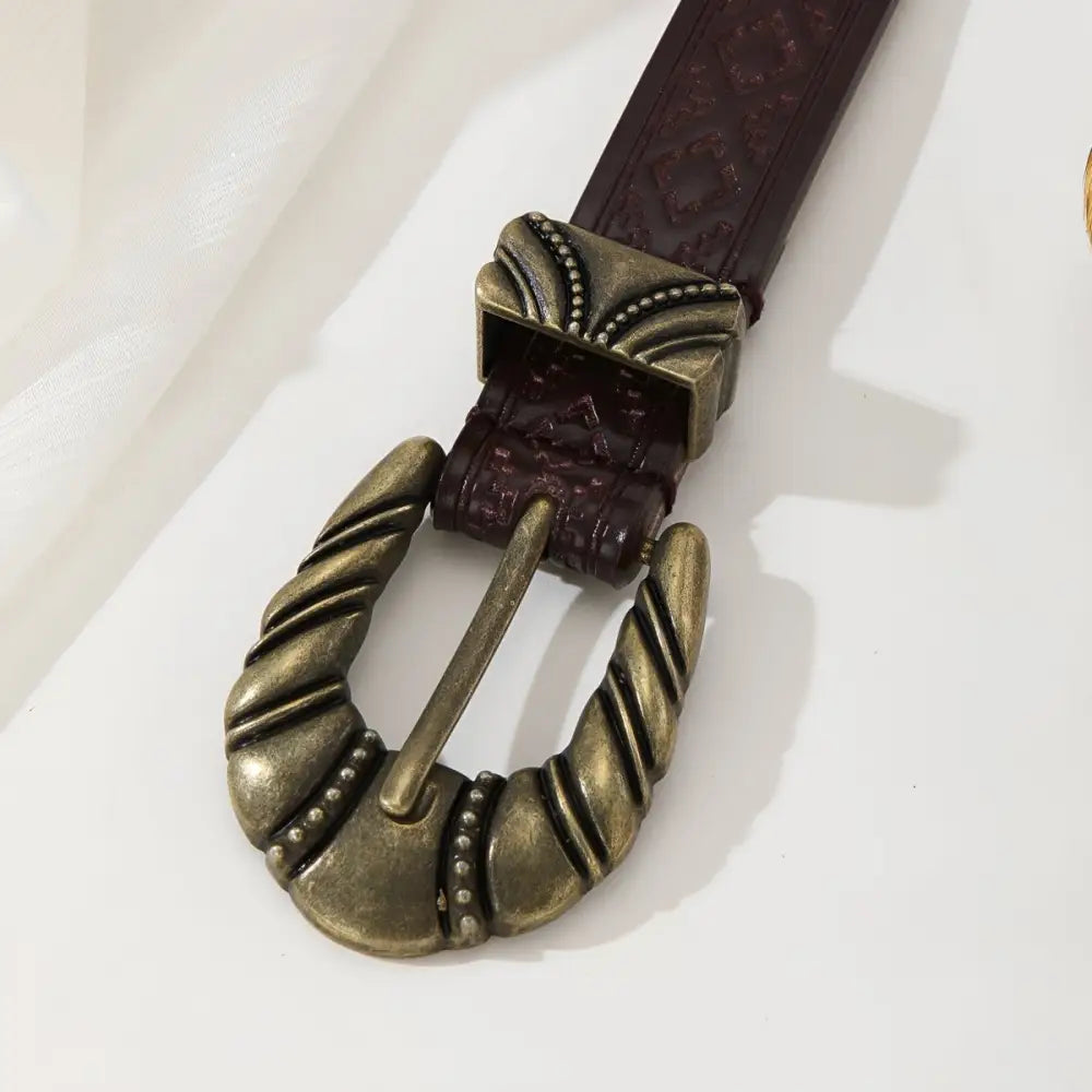 Brown leather Imada Western Belt with ornate metal buckle and tip for western style