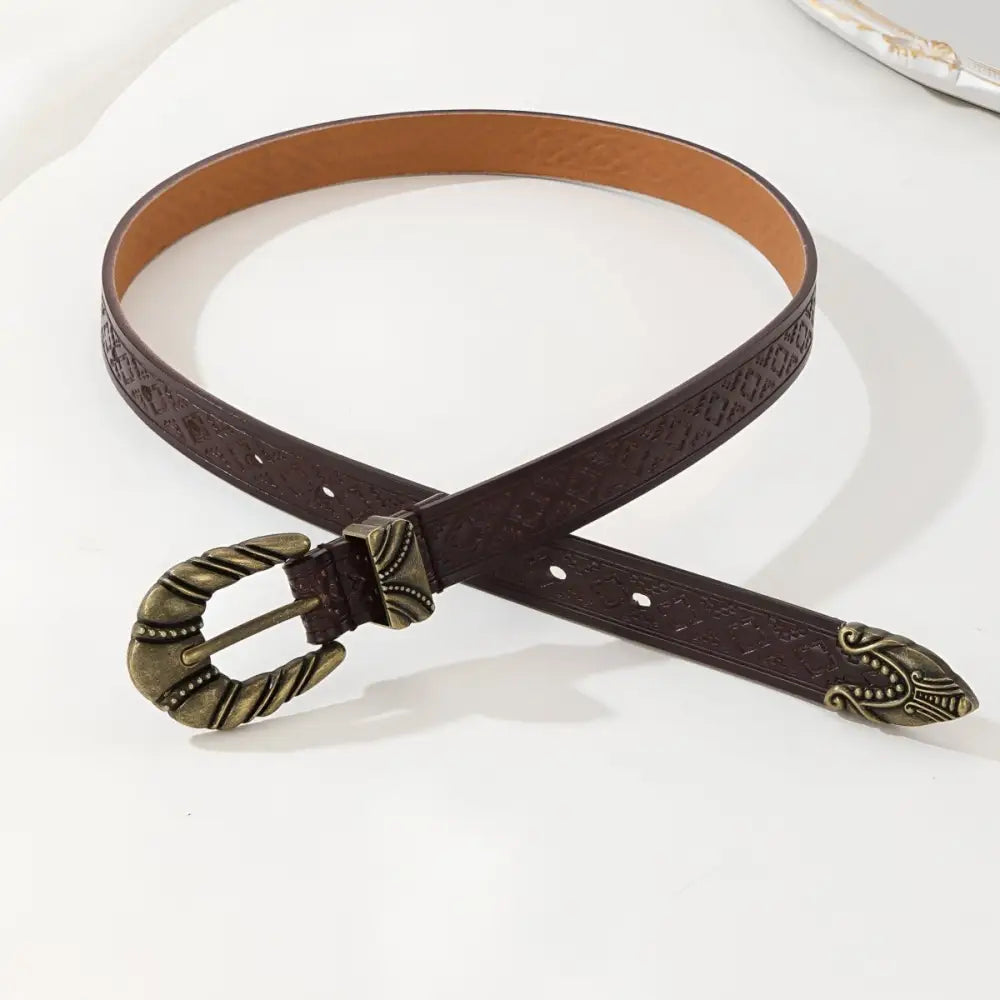 Brown patterned Imada Western Belt with ornate metal buckle and tip for western style