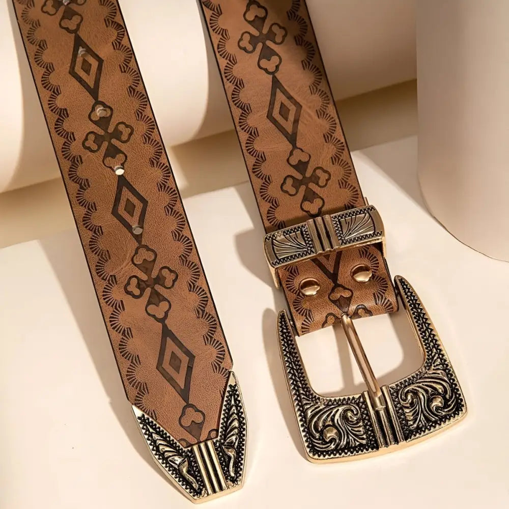 Brown patterned belt with ornate buckle showcasing the Maeda Western belt style