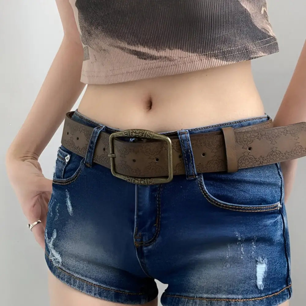 Brown leather western belt with large decorative buckle for stylish wear