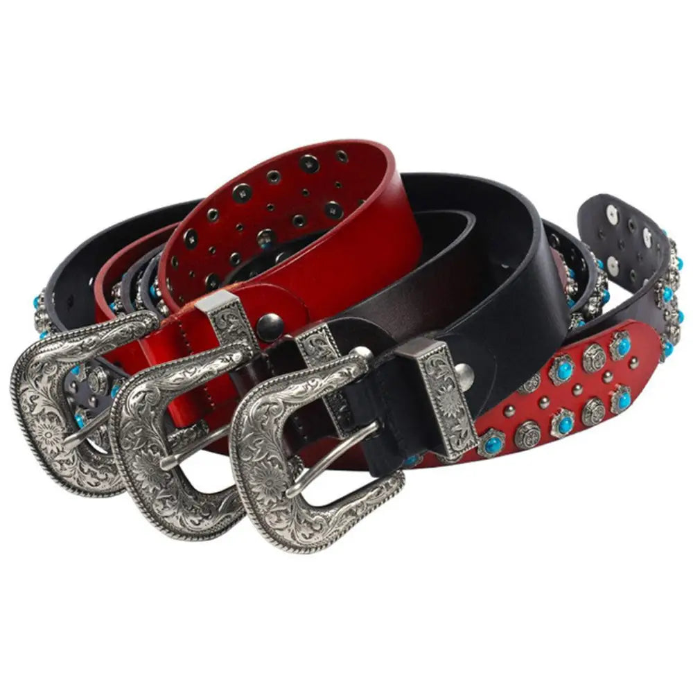 Three western-style belts including the Freda Western Belt with turquoise and silver embellishments