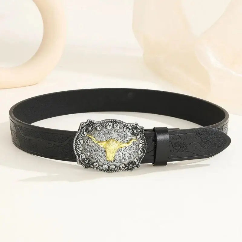 Black leather belt featuring an ornate bull buckle for a stylish western accessory