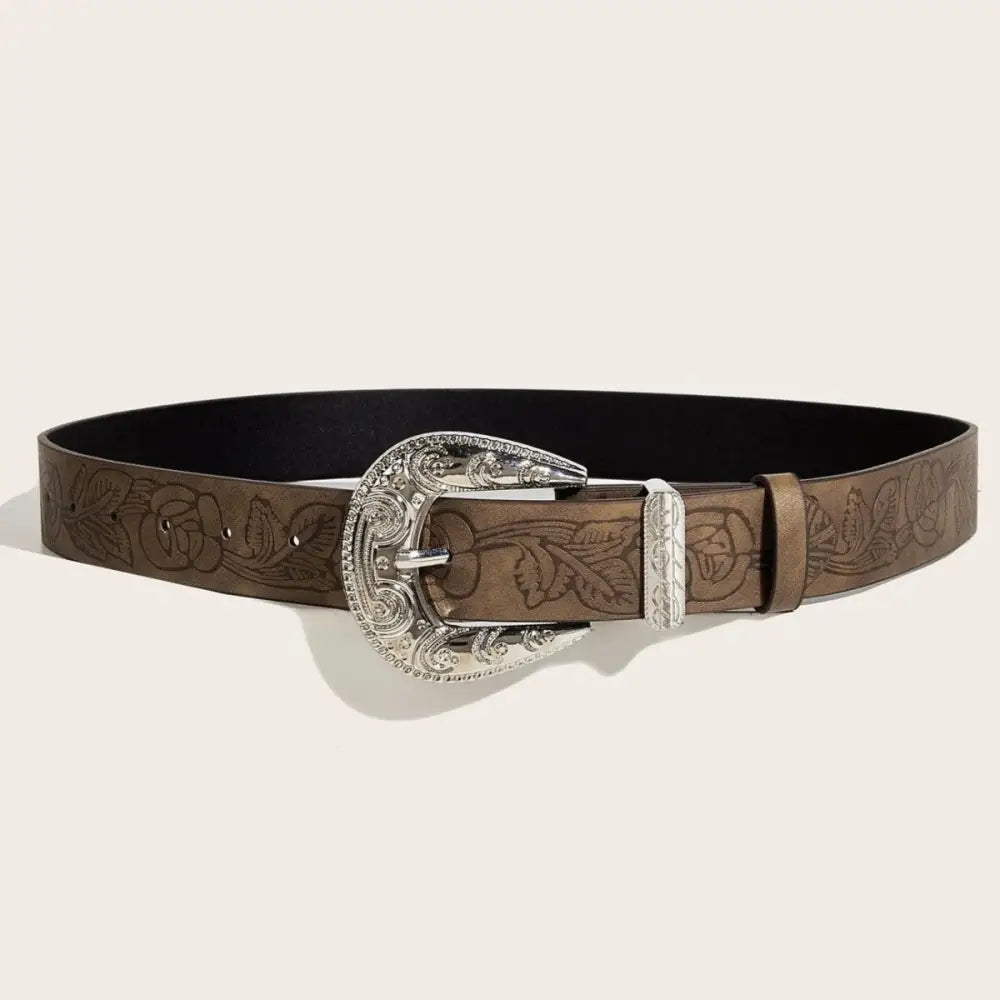 Brown leather belt featuring an ornate silver buckle for stylish accessories
