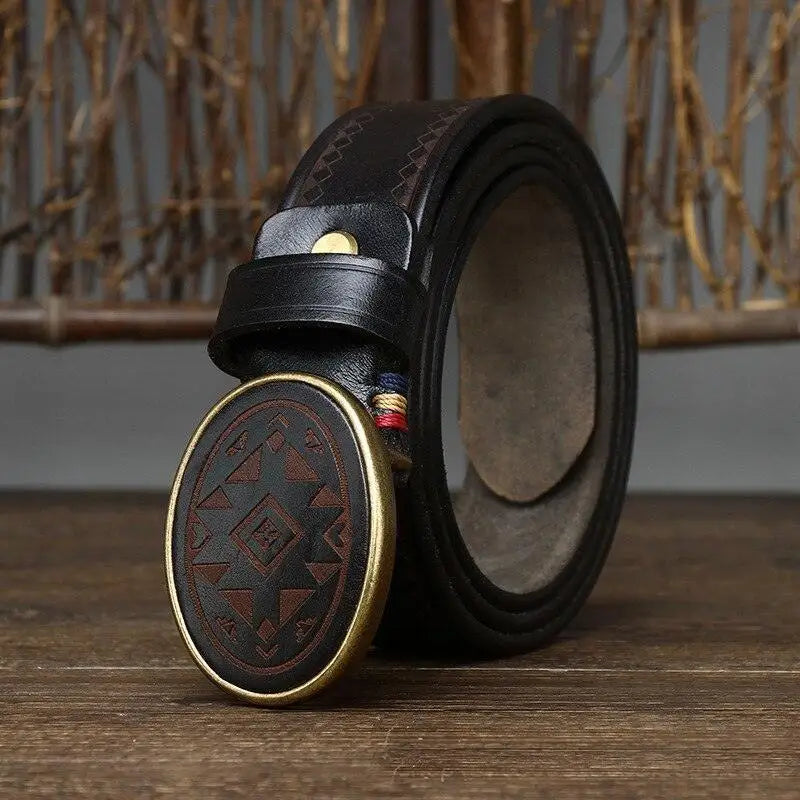 Sciria Belt from the Collection featuring a black leather design and patterned buckle
