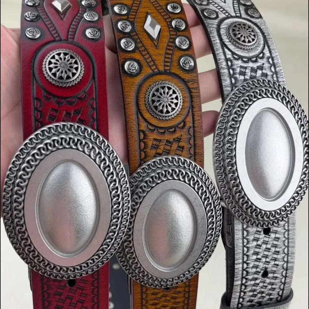 Elegant Tiwa belt set featuring decorative leather belts with studded details and oval buckles