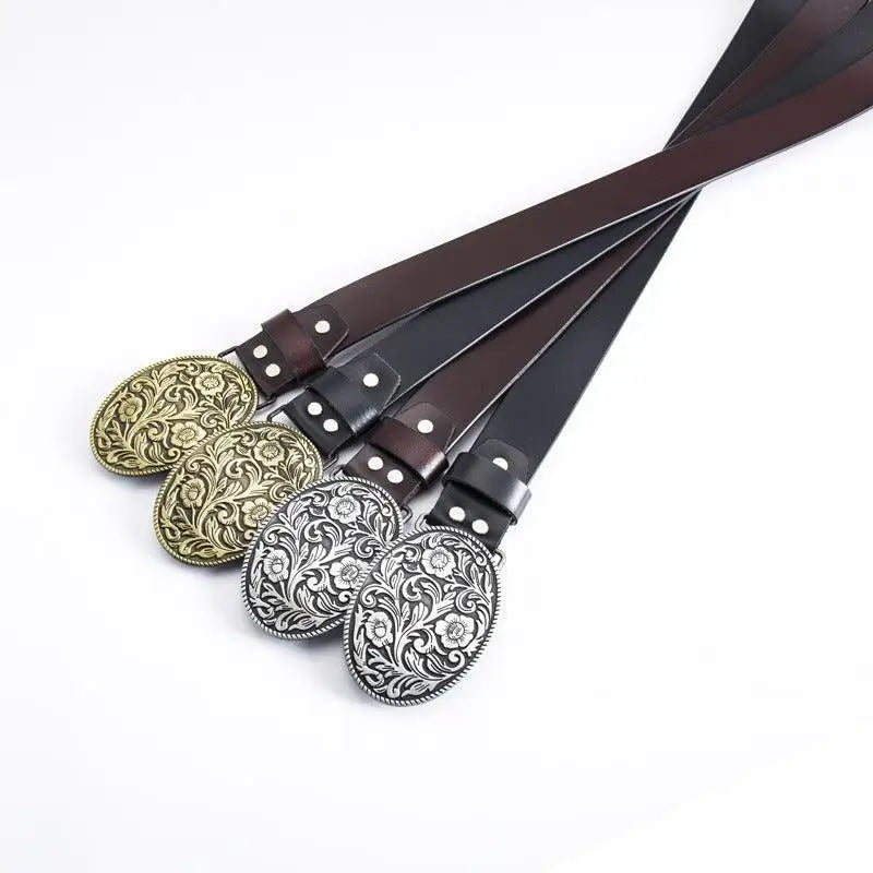 Assorted leather belts with ornate buckles displayed in the product Assorted Leather Belts with Ornate Buckles
