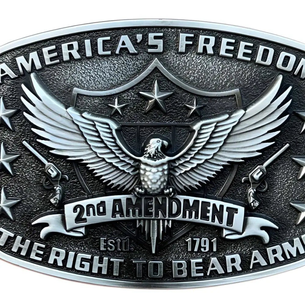 Silver-colored belt buckle with eagle and guns design from Silver Ornate Belt Buckle collection