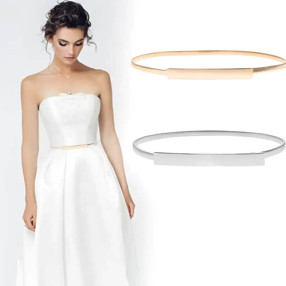 Woman in white dress wearing Dhoxia Slim Belt with gold-toned buckle for elegant fit