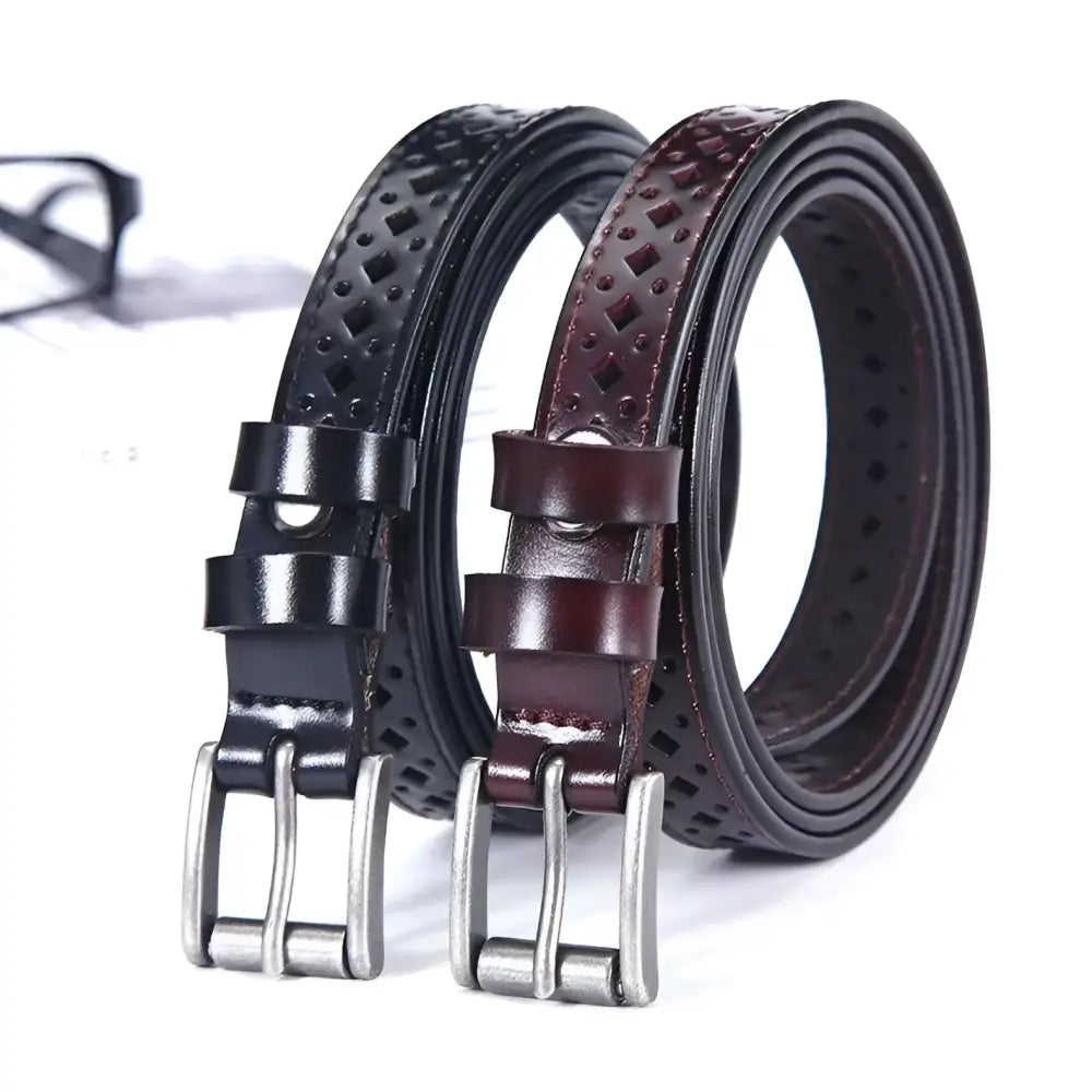 Leather belts with decorative perforations displayed with Distressed Denim Shorts