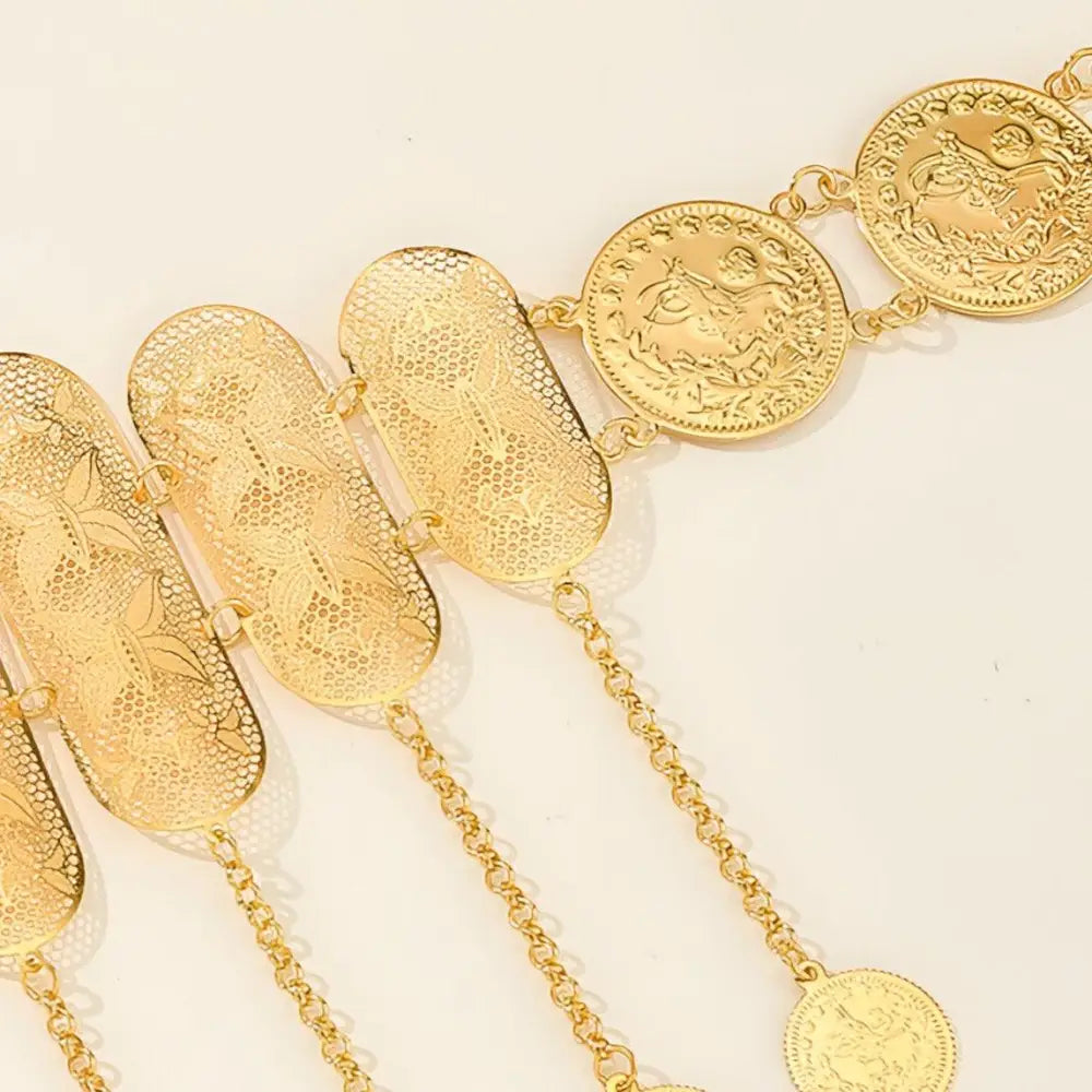 Elegant gold-toned Moroccan belt featuring coin and filigree details for sophisticated style