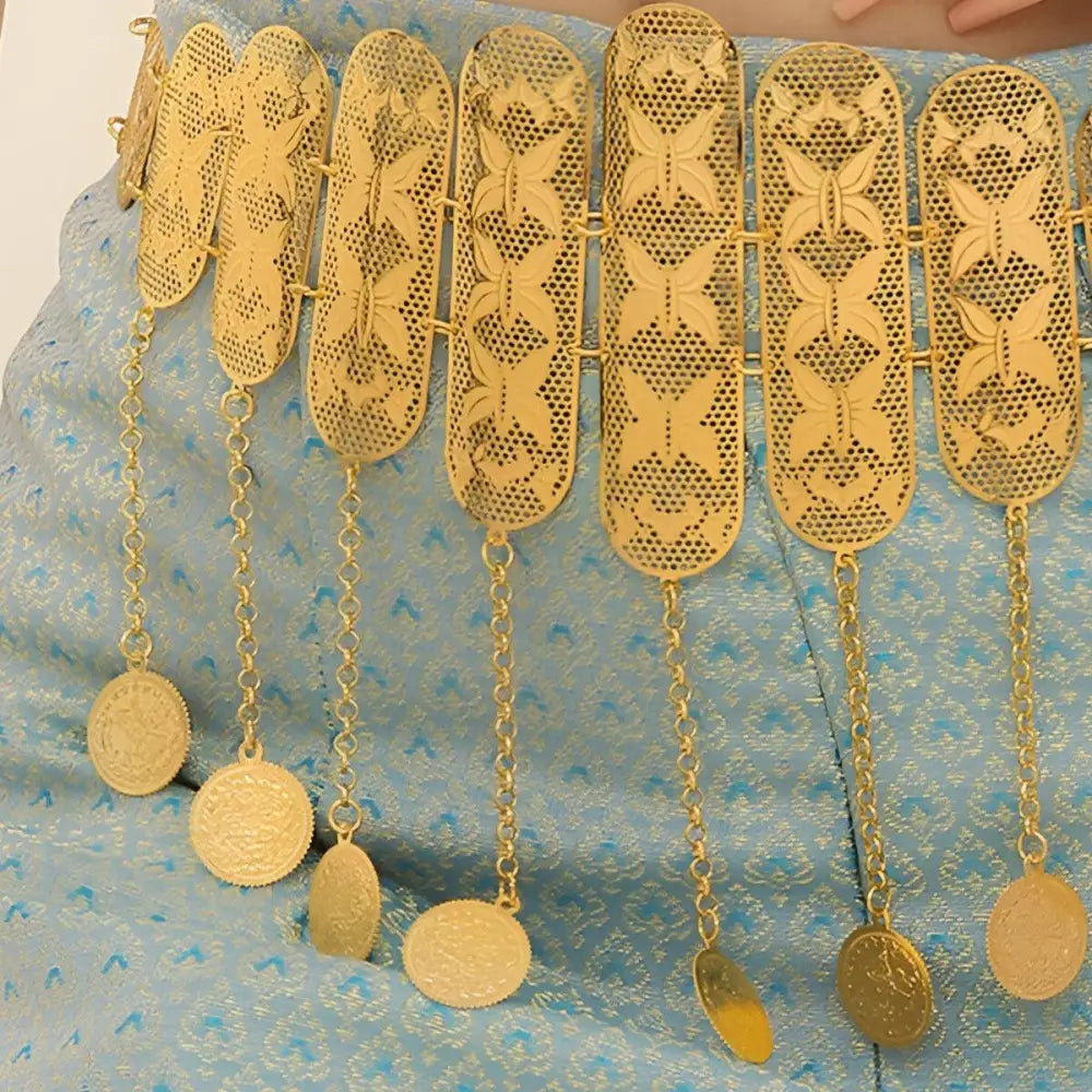Elegant gold Moroccan belt with butterfly pattern, dangling coins, and filigree details