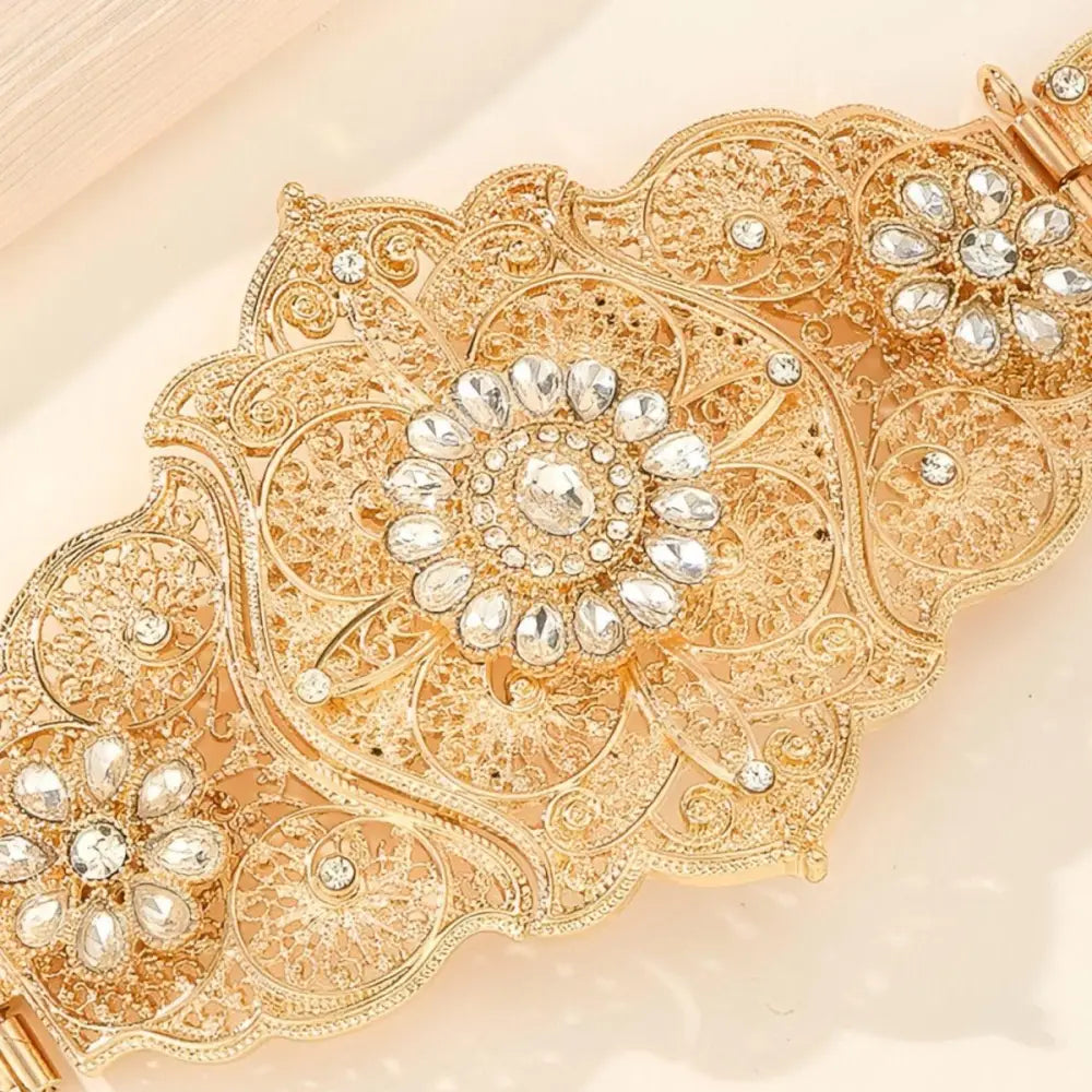 Elegant ornate gold Moroccan belt with jeweled floral accents for sophisticated style