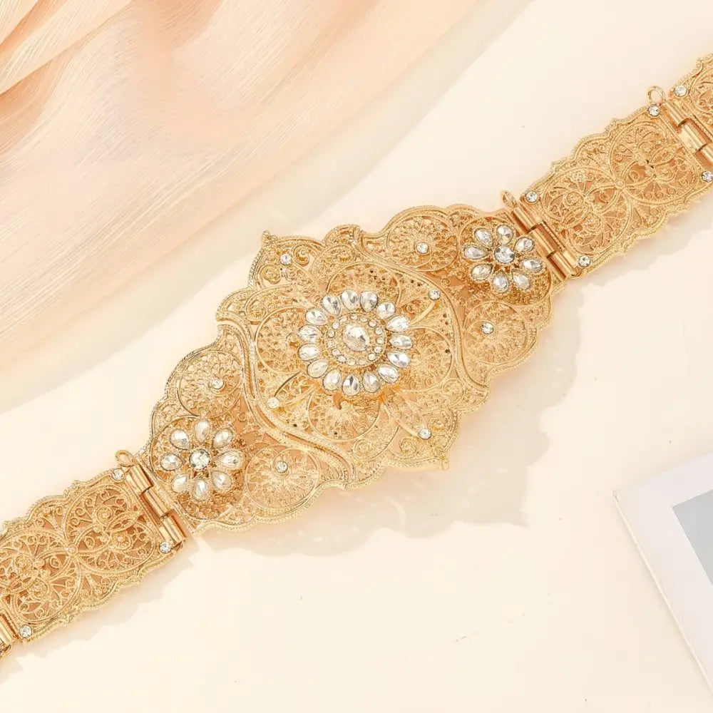 Elegant ornate gold Moroccan belt with floral embellishments for sophisticated fashion