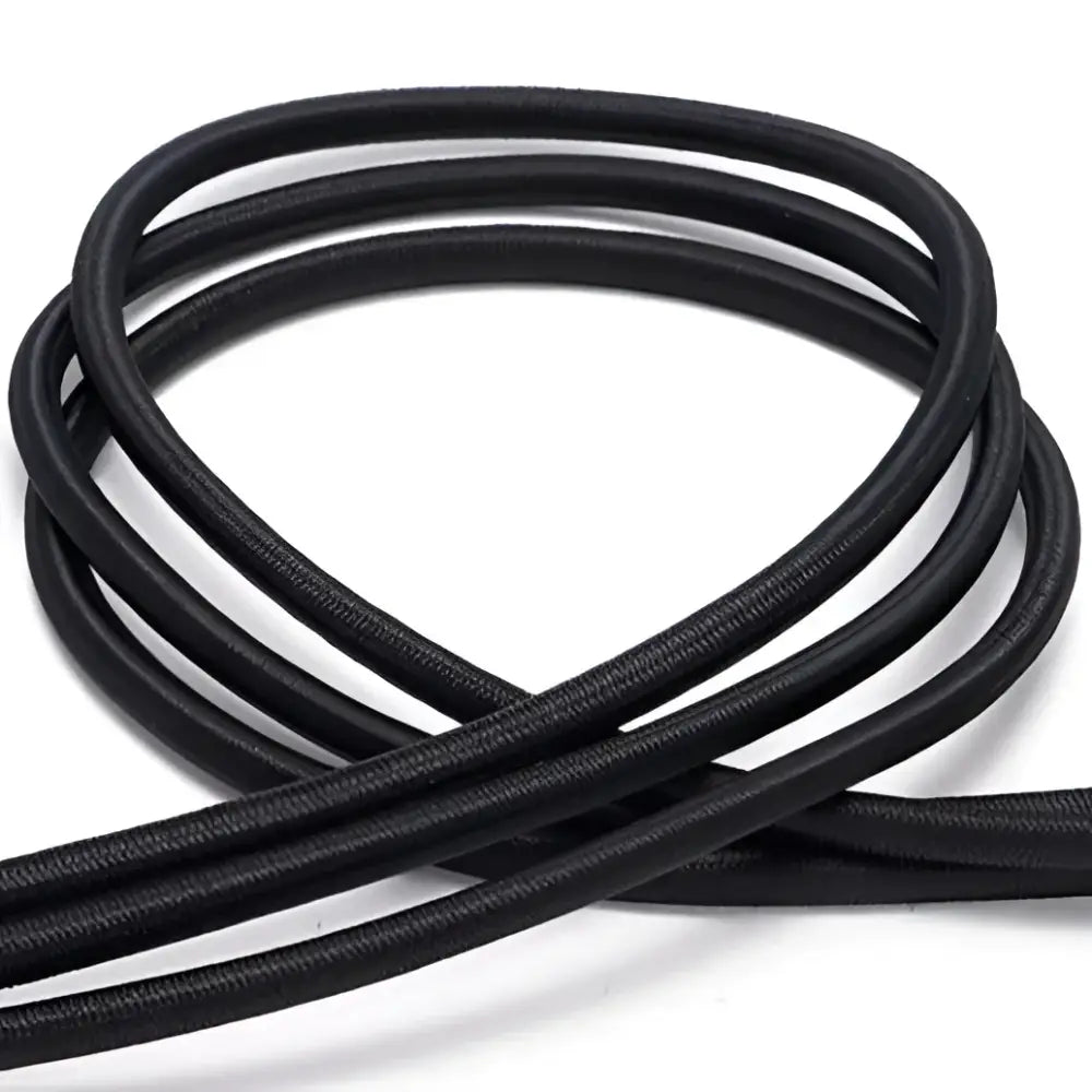 Black elastic cord used for Madona belt in trendy women’s fashion with Elegant White Blazer