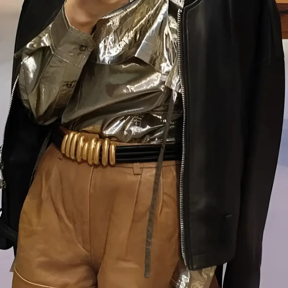 Elegant white blazer with Madona belt, stylish metallic top, and leather shorts for trendy women
