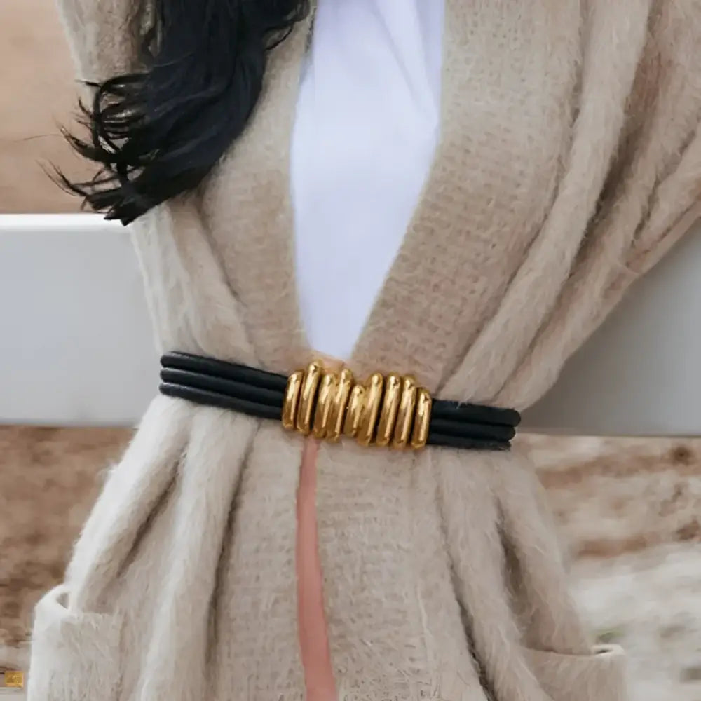 Black belt with gold accent featuring Madona belt for trendy women’s fashion