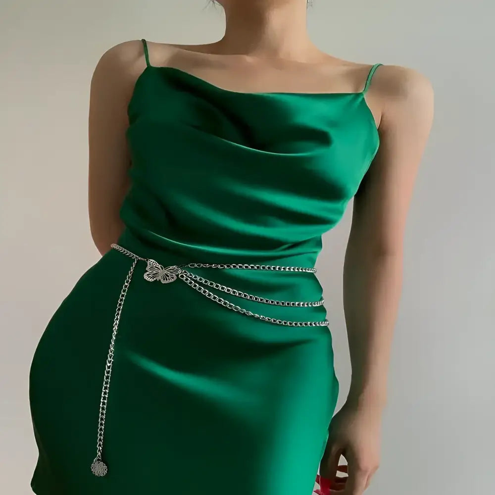 Black long-sleeved top with Fienousa belt, perfect for pairing with Emerald Satin Slip Dress