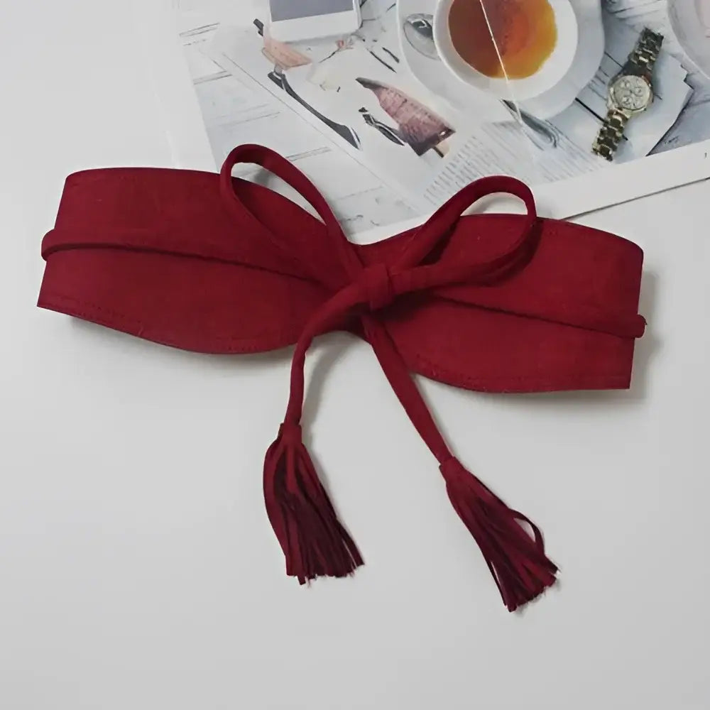 Maroon tassel-tie belt on Floral Print Dress with Red Sash and Tassel Belt