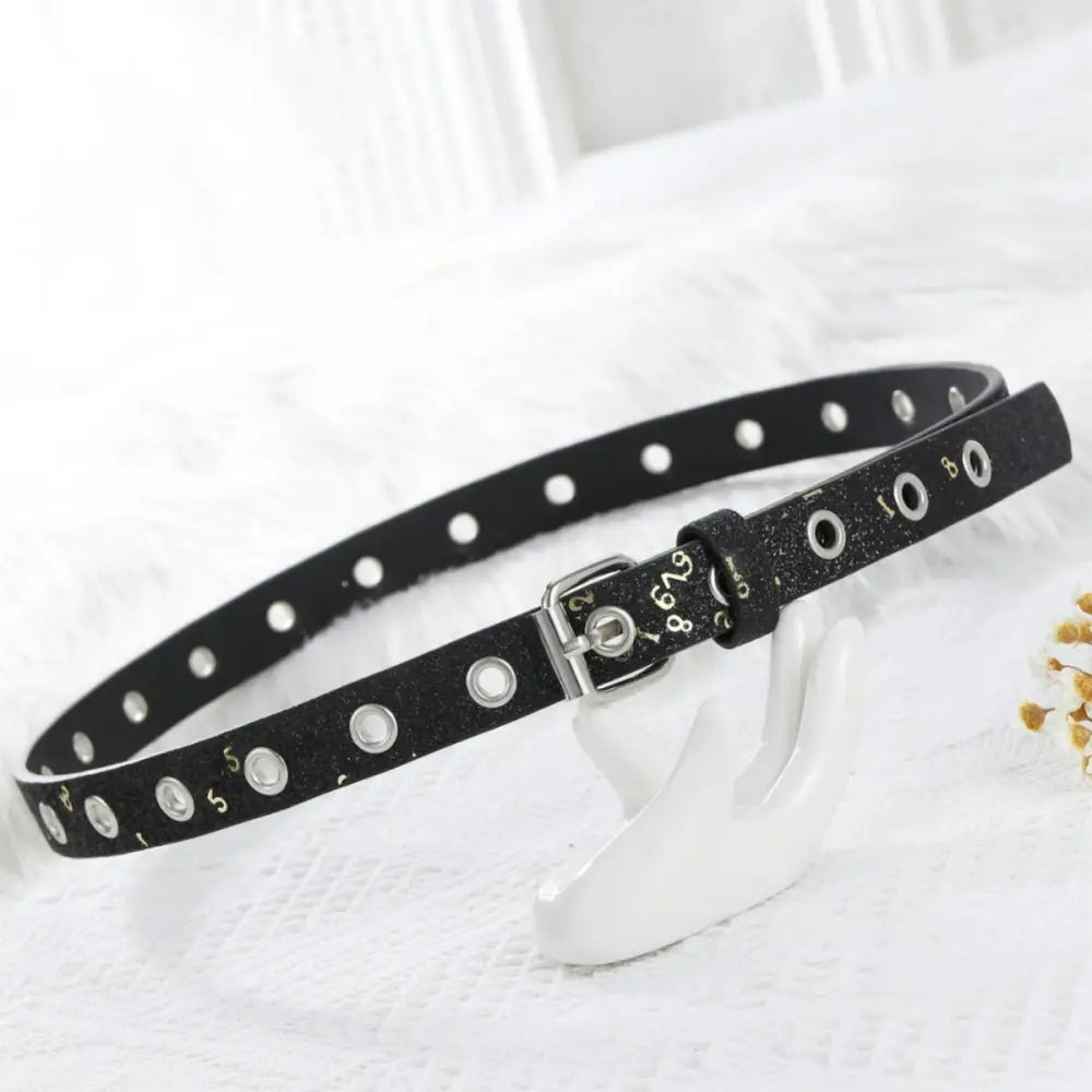 Black belt with silver buckle and grommets from Glittery Belts collection
