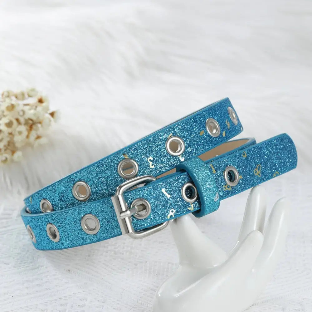 Sparkly blue belt with silver buckle and grommet details from Glittery Belts collection
