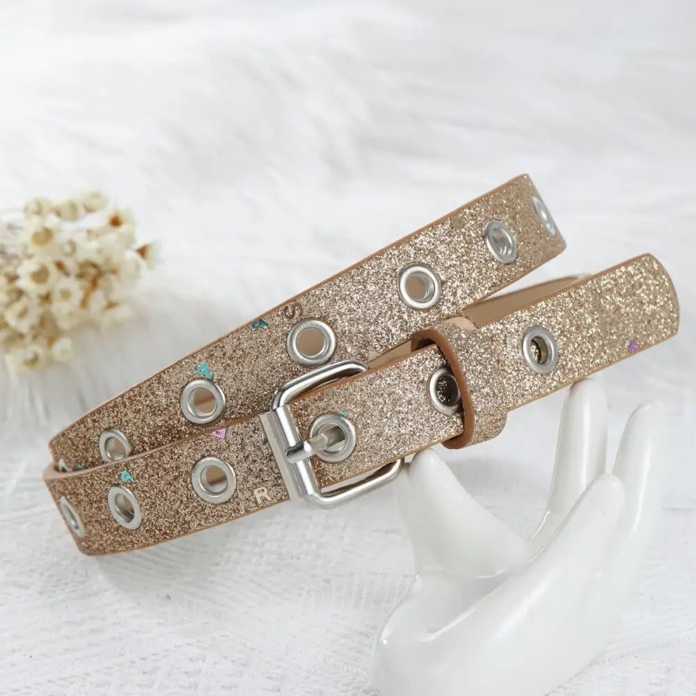 Glittery gold belt with silver grommets from Glittery Belts with Silver Buckles and Grommet Details