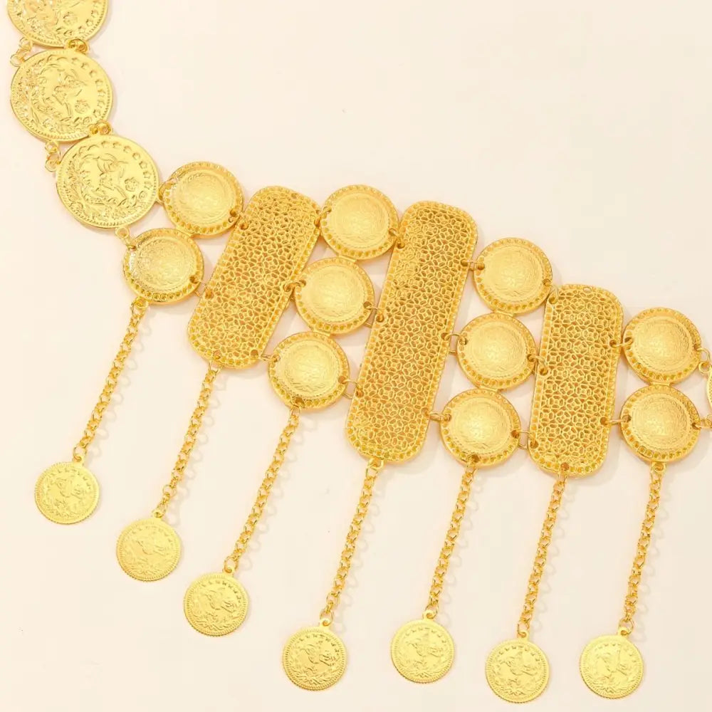 Gold coin and mesh belt with dangling pendants for a stylish accessory display