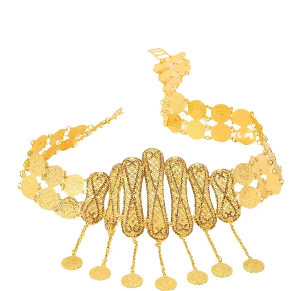 Gold coin and intricate filigree belt belly chain accessory displayed thoughtfully