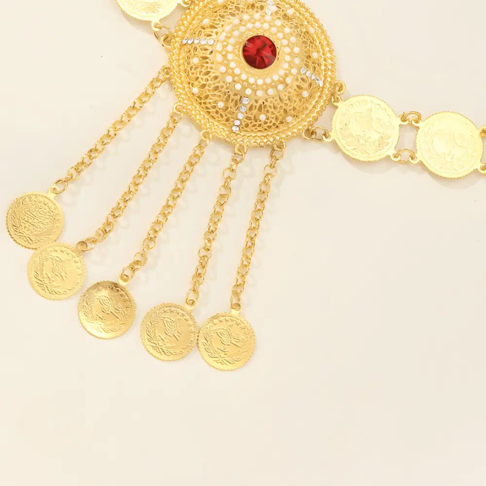 Gold-colored coin belt with red gem and medallion detail for elegant jewelry style