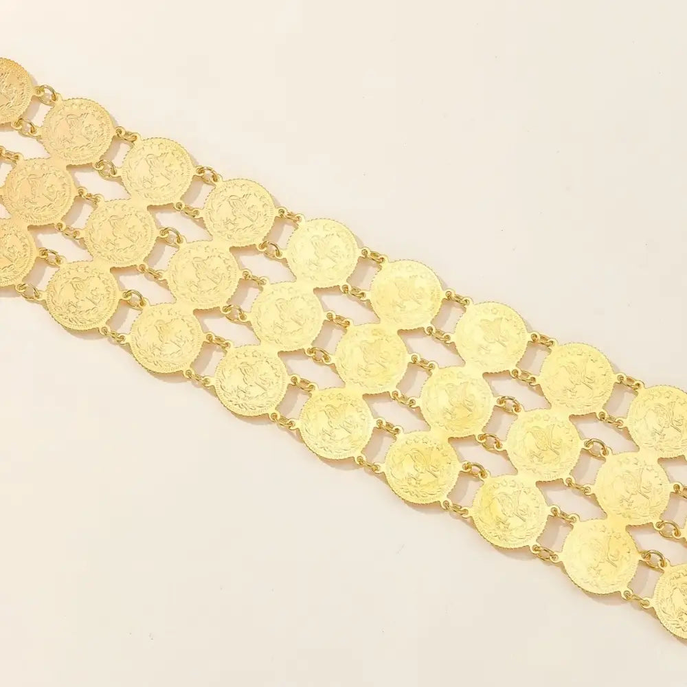 Gold coin belt featured in the Gold Coin Belt and Bracelet Set displaying intricate craftsmanship