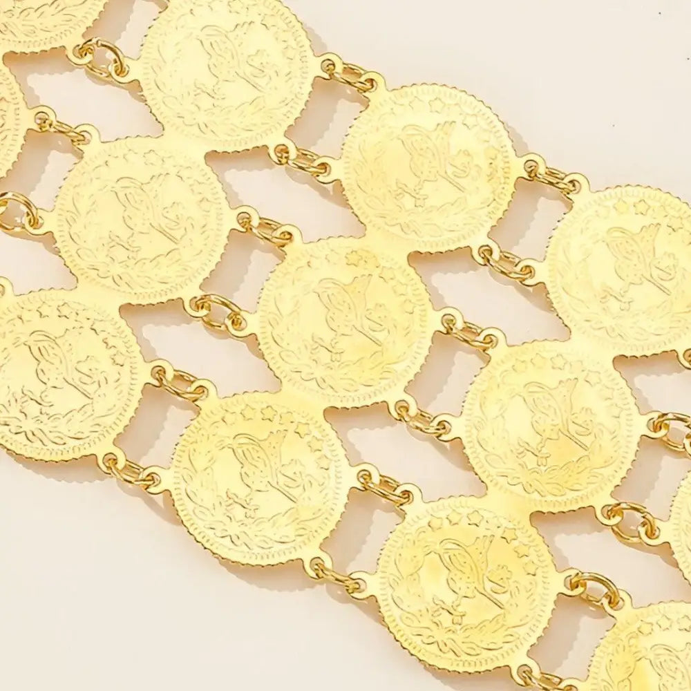 Gold coin belt featured in the Gold Coin Belt and Bracelet Set for elegant accessories