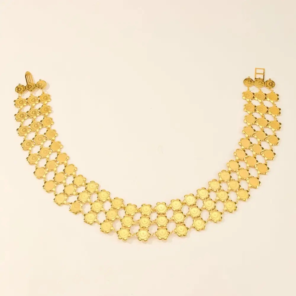 Gold floral-linked necklace from Moroccan belt collection for elegant style