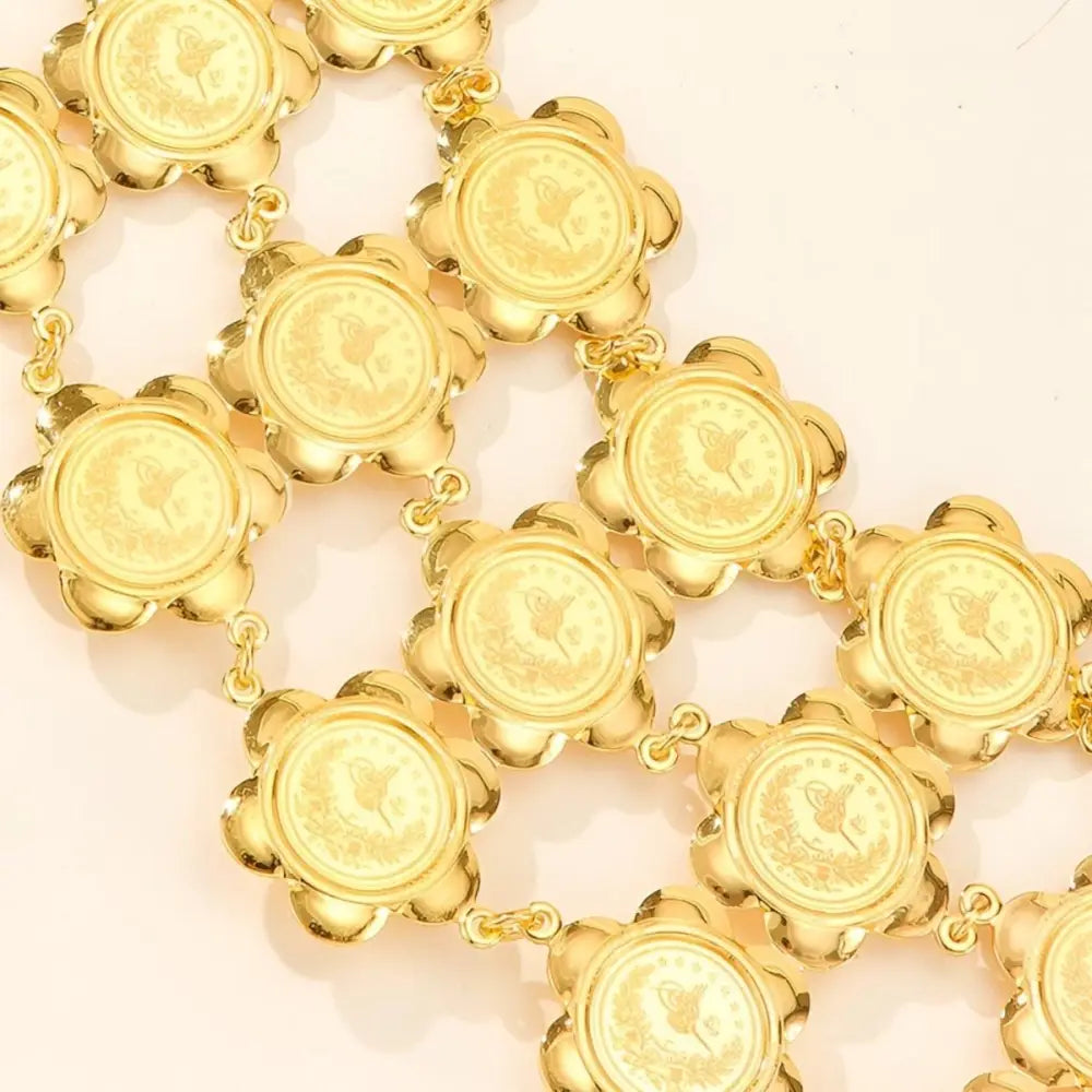 Gold coin necklace featured in Gold Floral Medallion Chain and Moroccan Belt for elegant style